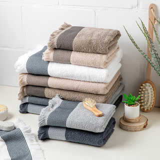 Ręcznik bawełniany z frędzlami Miss Lucy Natika 30x50 cm beż