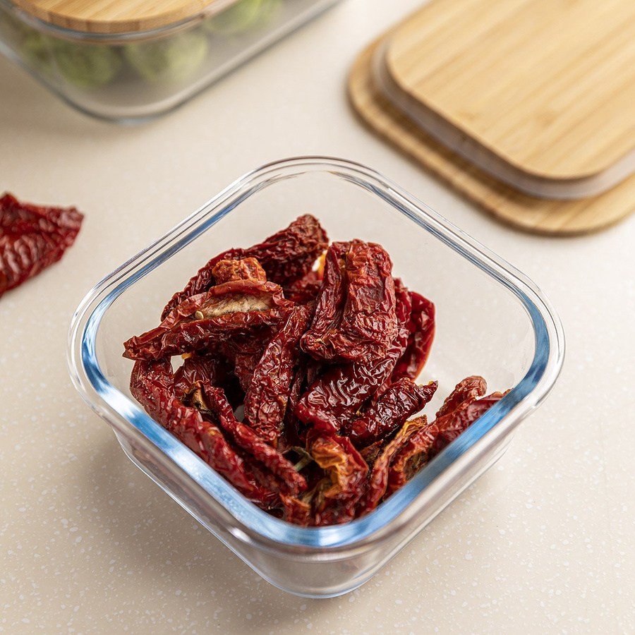 Szklany pojemnik z bambusową pokrywką do przechowywania żywności Florina Clavato 1,2 l